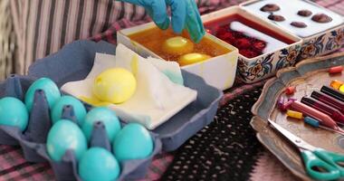 Enjoy an engaging exploration of the egg painting process where vibrant Easter eggs are decorated using various techniques. video
