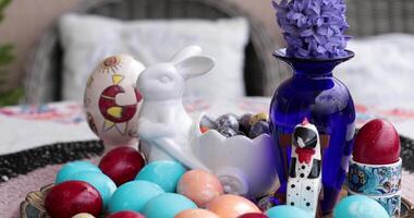 Colorful display of Easter eggs captured in a still life arrangement. Observe the step of egg painting process as vibrant colors bring each egg to life, perfect for Easter festivities. video