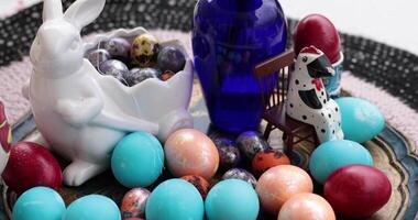 Spring still life Easter eggs centerpiece. Explore techniques for decorating the eggs in various colors, perfect for festive celebrations. video