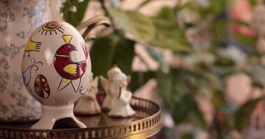 Explore a charming setup featuring cozy Easter decorations that enhance the warmth of your home. Discover unique ideas for Easter decor that brighten your living space in style. Rack focus video