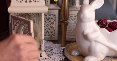 Learn to arrange a nest inside a vintage lantern for cozy Easter decorations. This creative display adds a charming touch to your Easter home decor, enhancing your festive atmosphere. video