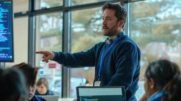 The teacher explaining coding photo