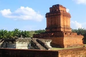 Sipamutung Temple Remains at padang lawas Regancy, Indonesia. Majestic brick Candi Sipamutung temple. Ancient architecture. photo