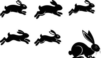 Silhouettes of easter bunnies isolated on a white background. Set of different rabbits vector