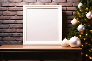 A blank frame on a table next to a christmas tree photo