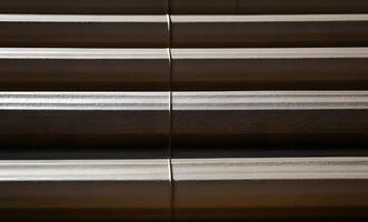 Each vertical strip has a unique texture, some appearing more corrugated photo