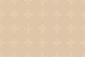 Motif cross stitch ethnic pattern motif brown cream background fabric pattern. vector