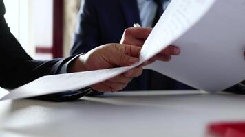 Businessman signing and stamping on contract document video