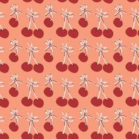 Seamless pattern of red cherries with stems on peach background vector