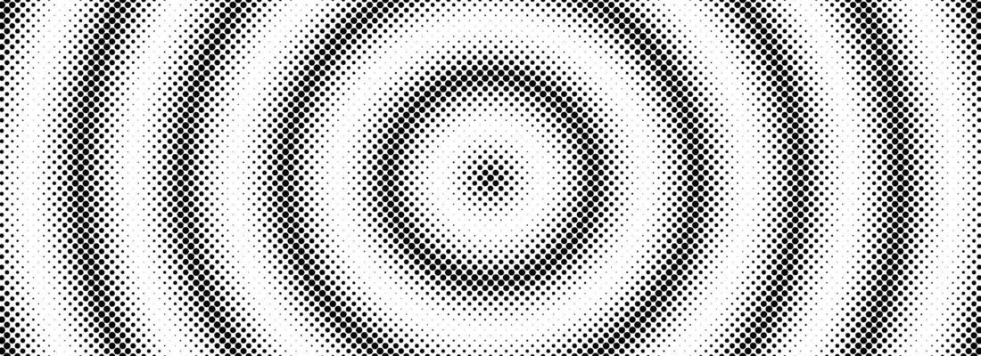 Halftone circle background. Black and white dotted circular gradient. Radial comic target texture. Fading dot epicenter wallpaper concept. Grunge rough round pop art rasterized backdrop