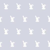White Rabbit Silhouette Isolated on Soft Grey background. Baby Nappy Print Swatch, Childish Textile Seamless Fabric Pattern Background. Easter mascot Bunny Symbol for Holiday Gift Wrapping Paper vector
