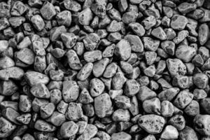 small pieces of dranite in black and white photo