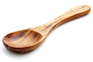 Wooden serving spoon. A smooth, light-brown wooden spoon with a rounded bowl and a long handle. Perfect for serving condiments or sauces photo