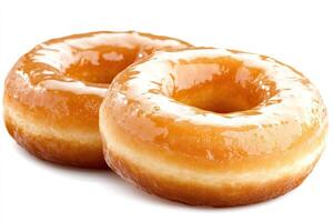 Two glazed donuts. Close-up view of two golden brown, glazed donuts, with a glossy, sugary glaze. A delicious, sweet, and tempting treat photo