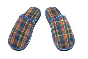 Checked slippers over white photo