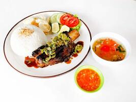 Rice and grilled ribs photo