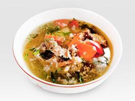 Beef soup isolated on white background photo