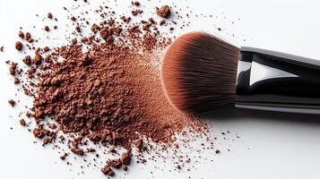 Makeup powder in a brown color with a brush on a white background. 2 photo