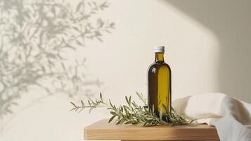 A wooden table with a bottle of oil on a base of olive branches and a small white tablecloth. 2 photo