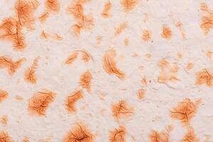 Thin pita bread as a background macro photo. photo