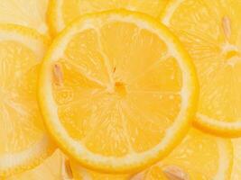 Sliced lemon as a background horizontal photo. Citrus, lemon. photo