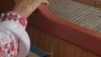 weaver makes fabric in ethnic loom 18 video