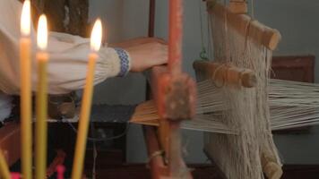 weaver makes fabric in ethnic loom 9 video