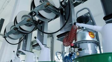 Motor oil in barrels with pump indoors with copy space. Store of lube. Product for bottling close up. Maintenance. Warehouse inside. Background of automotive shop. Auto service. Change of oil. 7 video