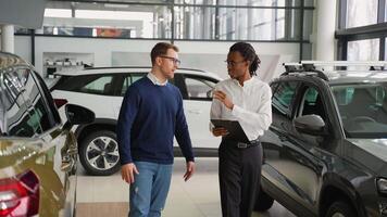 Car Salesman Assisting Customer in Choosing a New Vehicle video
