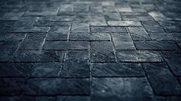 textured close up of dark stone tiles arranged in herringbone pattern, showcasing their rugged surface and intricate details photo