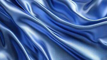 luxurious blue silk fabric with smooth ripples and soft reflections, creating elegant and sophisticated texture photo
