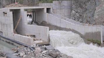 Unfinished Small Hydropower Plant Structure on a Mountain River, Slow Motion. video
