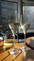 Beautifully Elegant Glasses Filled with Sparkling Wine Set Gracefully on a Table video