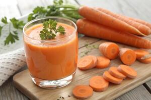 Fresh Carrot Juice with Sliced Carrots and Green Herb Garnish photo