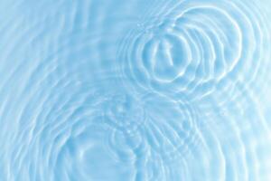 Summer Background,Water Waves Abstract Pattern Texture on Swimming pool,Top view Poolside with Light,Shadow on Blue water, Sea Blue Circle Surface with Ripples,Splashes with Sunlight photo