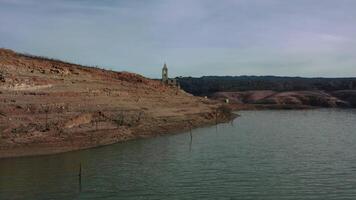 Aerial view of the Sau reservoir in drought. Catalunya video