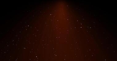 Rising sparkling particles in orange light. Abstract animation. video