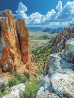 Rocky cliff viewpoint overlooking valley, distant mountains, cloudy sky photo
