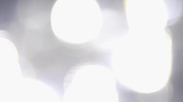 This footage showcases stunning abstract light effects with varying blur and focus, ideal as a captivating background or overlay in projects to enhance visual storytelling video