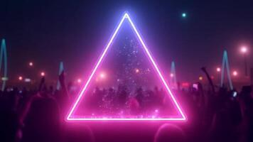 A neon triangle with people in front of it video