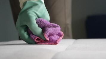 Cleaning a sofa with a cloth to remove stains and allergens video