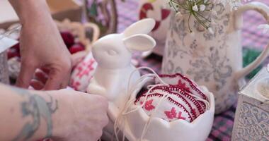 Home decor with cozy Easter decorations featuring unique heart shaped Easter ornaments. Add charm to your festive setup with these delightful decorations. video