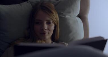 Enjoying a Cozy Night In The Perfect Setting for Reading Under Soft, Warm Light video