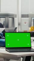Vertical Researchers analyze solar cell prototypes using green screen laptop to optimize energy production. Solar panels plant experts developing innovative manufacturing tech using mockup notebook video