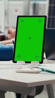 Vertical Industrial plant researchers work on breakthroughs in durability and performance using isolated screen tablet, close up. Factory scientists use chroma key device to test materials for solar panels video