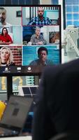 Vertical Photovoltaics plant researchers doing internet videocall, working on breakthroughs in durability. Factory research and development team in remote teleconference testing materials for solar panels video