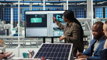 Factory research and development division scientists collaborate to test nanomaterials for next generation solar panels, aiming for breakthroughs in durability and performance, camera A video
