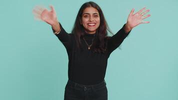 Woman showing inviting gesture with hands, ask to join, beckoning to coming, gesturing hello goodbye video