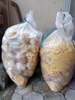 Stale bread that has expired in a plastic bag. Usually used for fish feed. photo