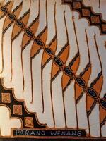 A close up of Javanese batik with a Parang Wenang pattern. Indonesian batik photo